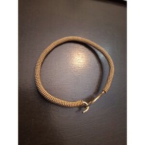 TuVous Gold Tone Coiled Wire Bracelet with Hammered Spiral Hook Clasp